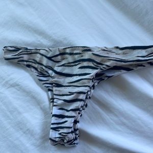 Aila blue swimsuit bottom zebra print - size small. Good condition